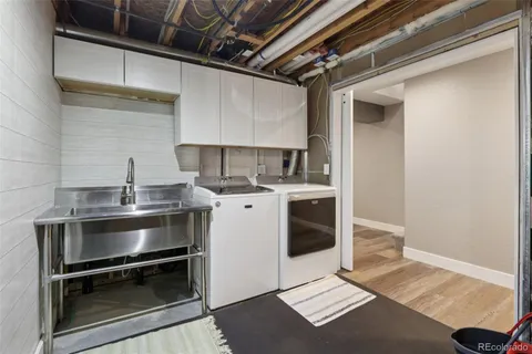 a kitchen with a stove and a sink