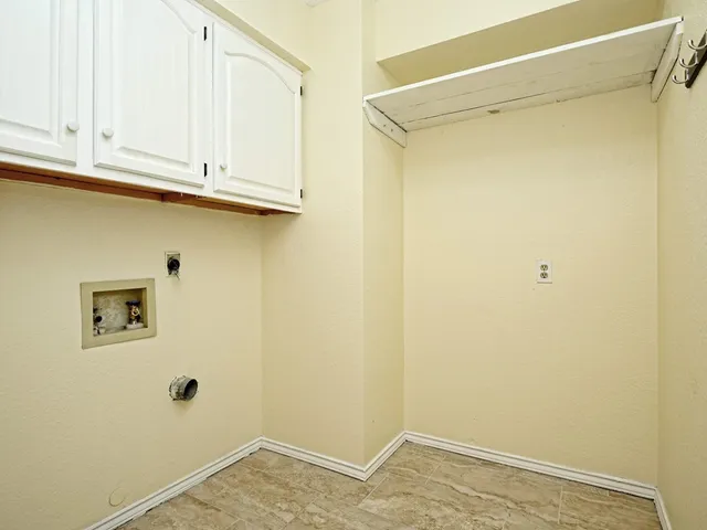 a view of a refrigerator in kitchen