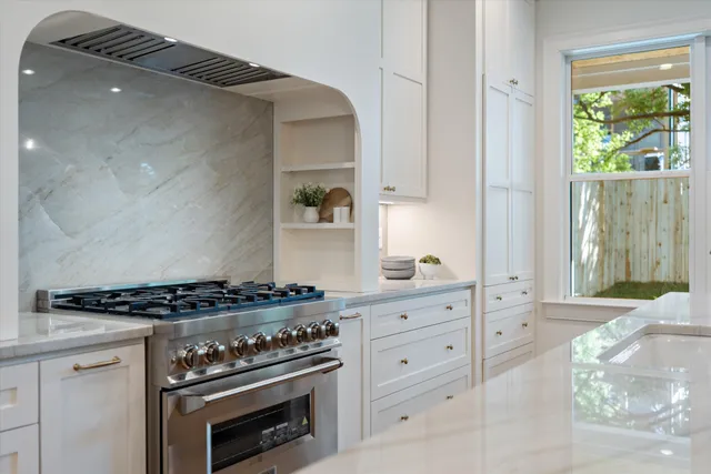 a bathroom with a sink and a window