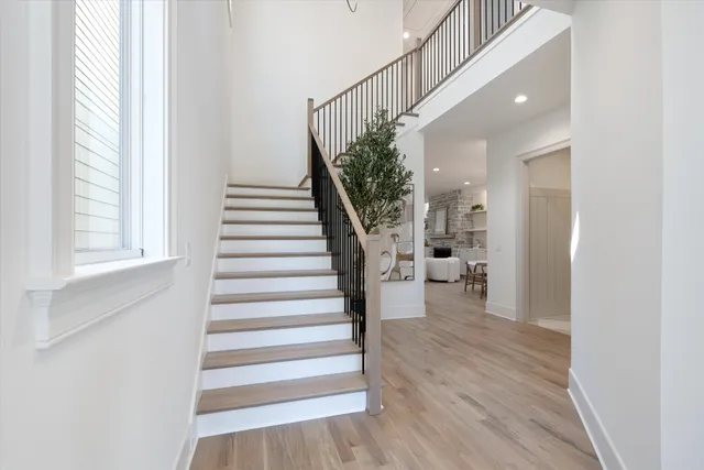 a kitchen with a table and chairs