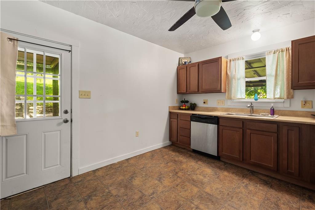 955 Boyce Road Bridgeville, PA 15017 - Photo 17 of 45 kitchen with entrance to the back porch