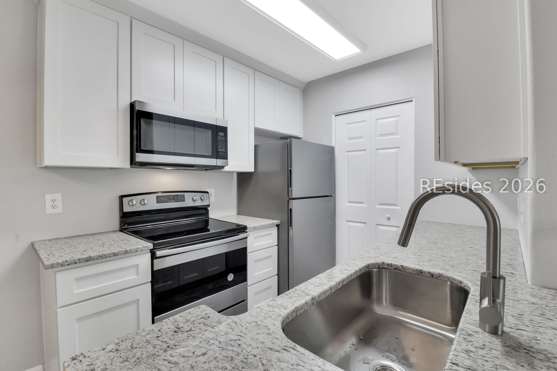 897 Fording Island Road, Unit 213 Bluffton, SC 29910 - Photo 4 of 32 Kitchen with Stainless Steel appliances