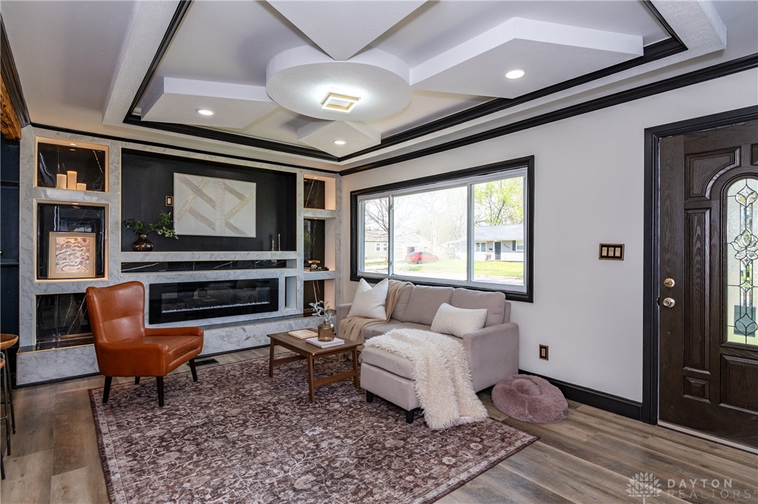 5240 Haverfield Road Dayton, OH 45432 - Photo 6 of 58 This living room features elegant recessed lighting and modern architectural details, perfect for comfortable gatherings.