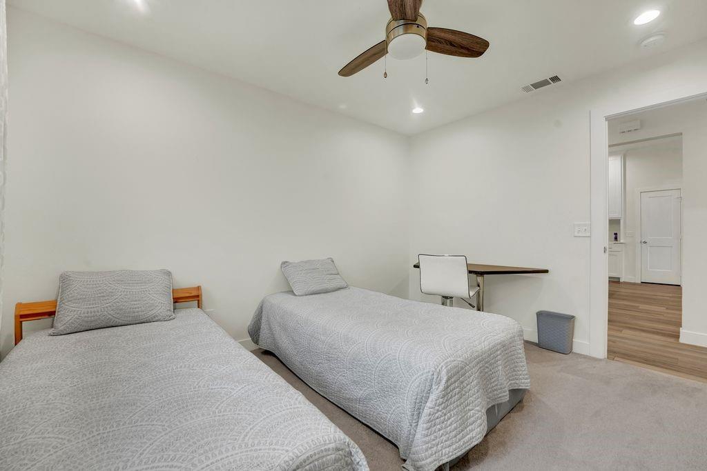 4035 Cedarview Road Dallas, TX 75287 - Photo 14 of 31 a bedroom with bed and window