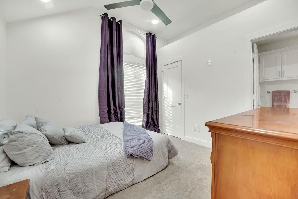 4035 Cedarview Road Dallas, TX 75287 - Photo 18 of 31 a bedroom with a bed and a dresser