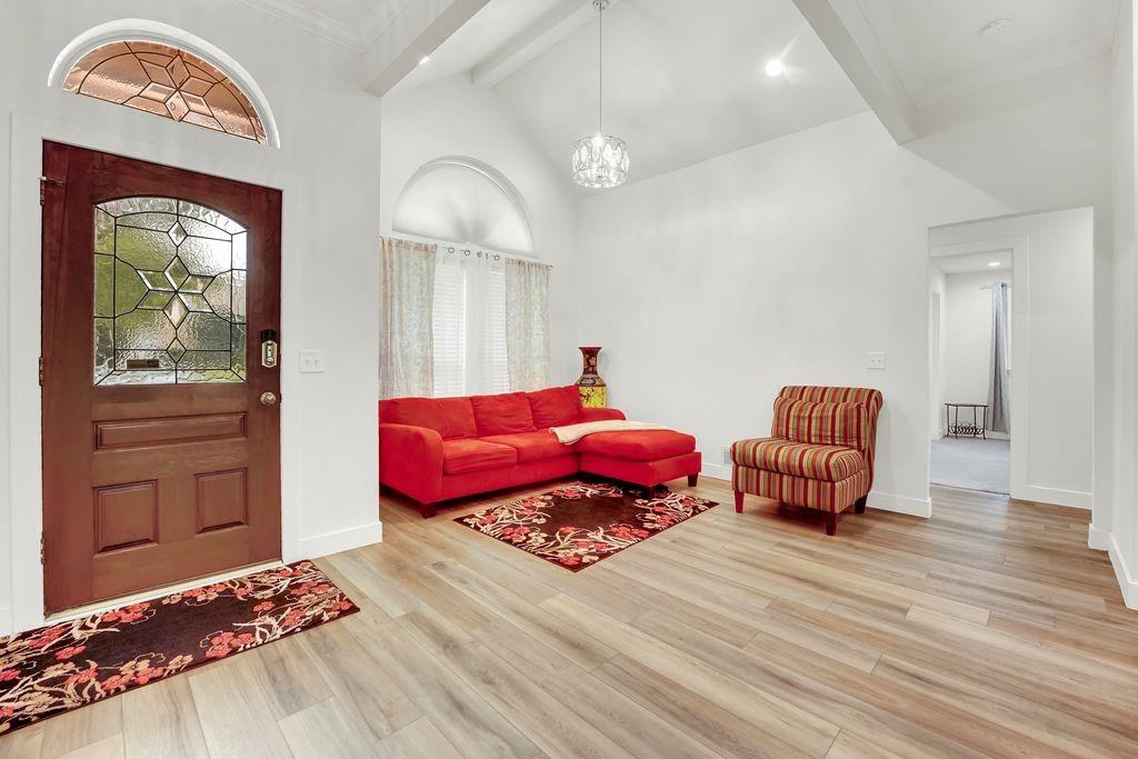4035 Cedarview Road Dallas, TX 75287 - Photo 2 of 31 a bedroom with a bed and a dresser in it