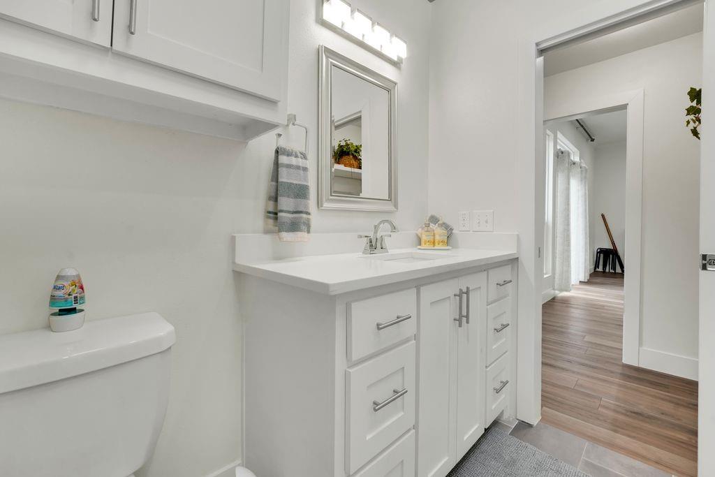 4035 Cedarview Road Dallas, TX 75287 - Photo 20 of 31 a bathroom with a sink double vanity and a mirror