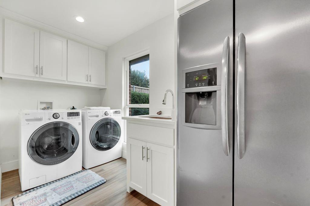 4035 Cedarview Road Dallas, TX 75287 - Photo 21 of 31 a utility room with sink dryer and washer
