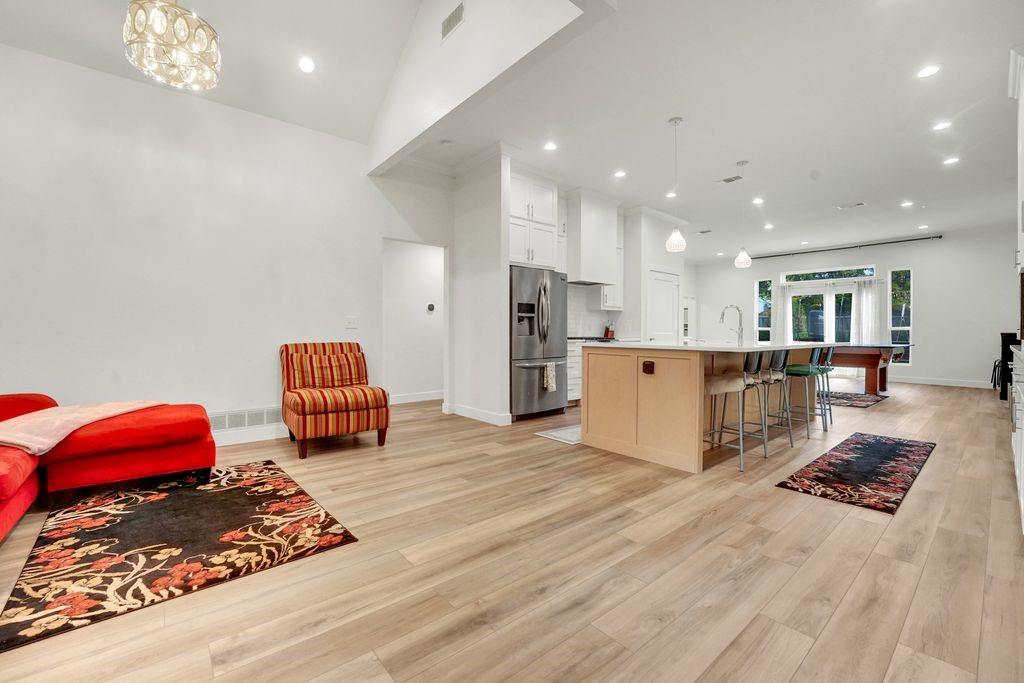 4035 Cedarview Road Dallas, TX 75287 - Photo 31 of 31 a living room with furniture and a table