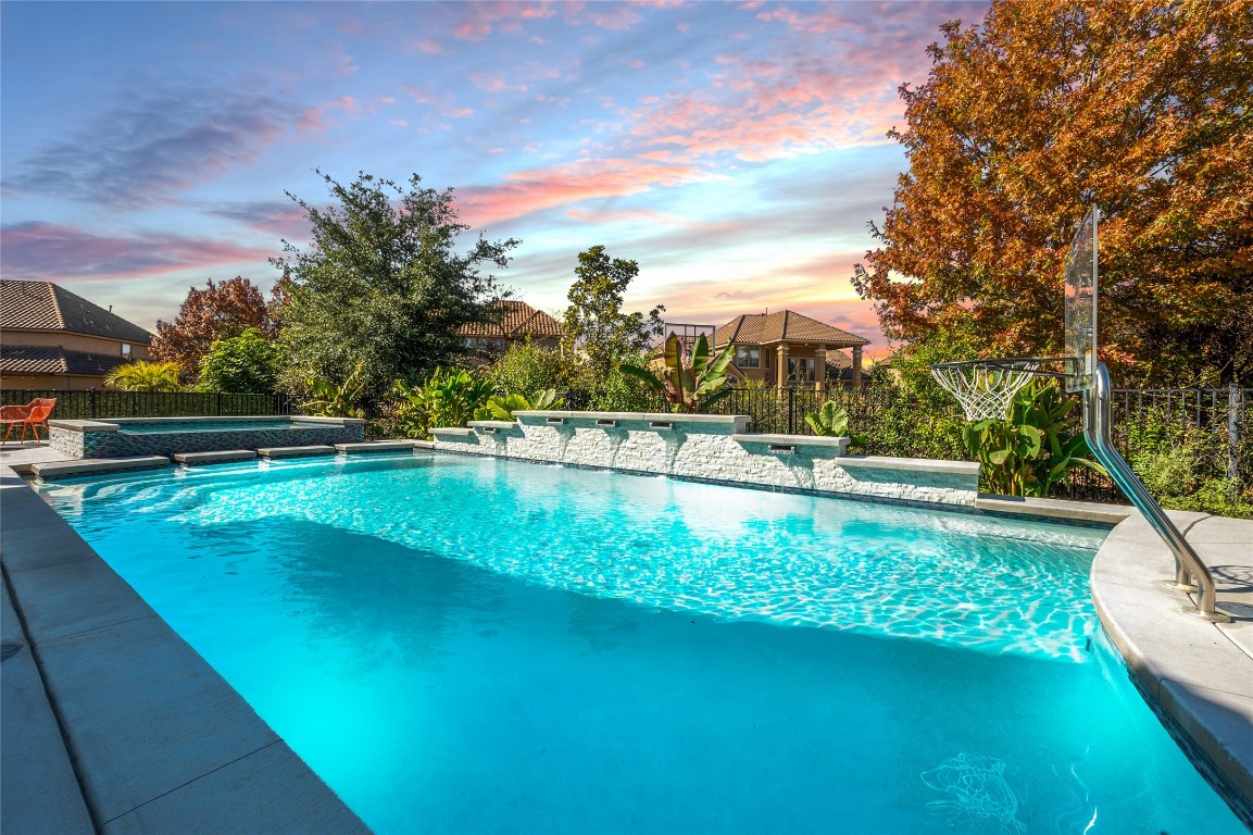 a view of a lake with a yard