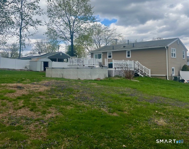 34 Keats Road Meriden, CT 06451 - Photo 17 of 19 a view of a house with a big yard and large tree