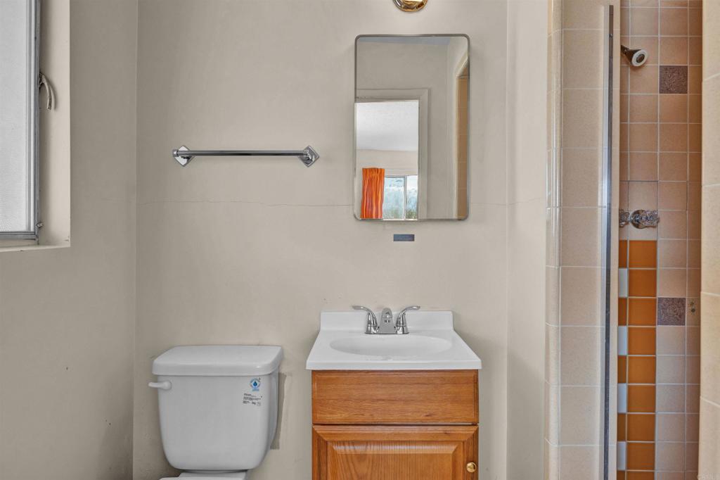 4235 Fletcher Road Borrego Springs, CA 92004 - Photo 21 of 31 a bathroom with a toilet sink and mirror
