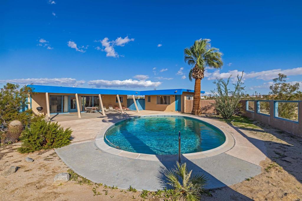 4235 Fletcher Road Borrego Springs, CA 92004 - Photo 26 of 31 a front view of a house with swimming pool
