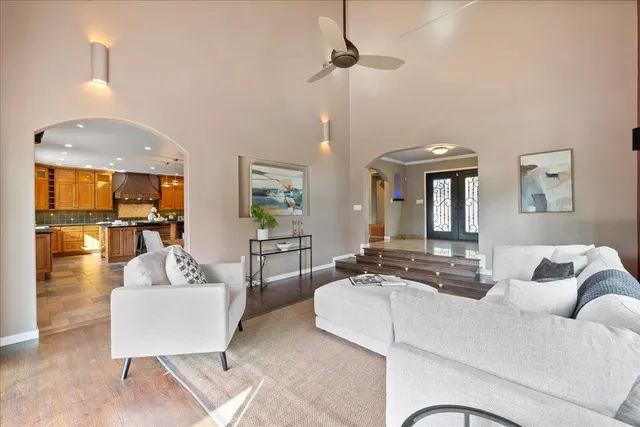 a kitchen with stainless steel appliances a stove a sink and a microwave