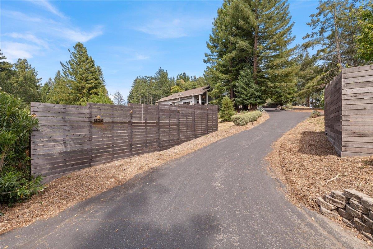 23435 Summit Road Los Gatos, CA 95033 - Photo 2 of 86 a view of street with wooden fence