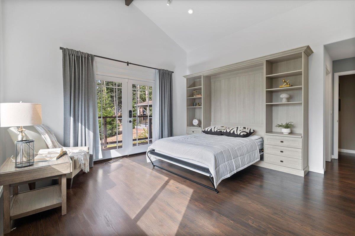 23435 Summit Road Los Gatos, CA 95033 - Photo 32 of 86 a bedroom with a bed and a large window