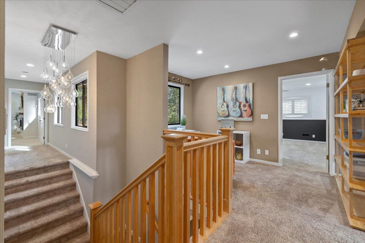 23435 Summit Road Los Gatos, CA 95033 - Photo 35 of 86 a view of a hallway with furniture and windows