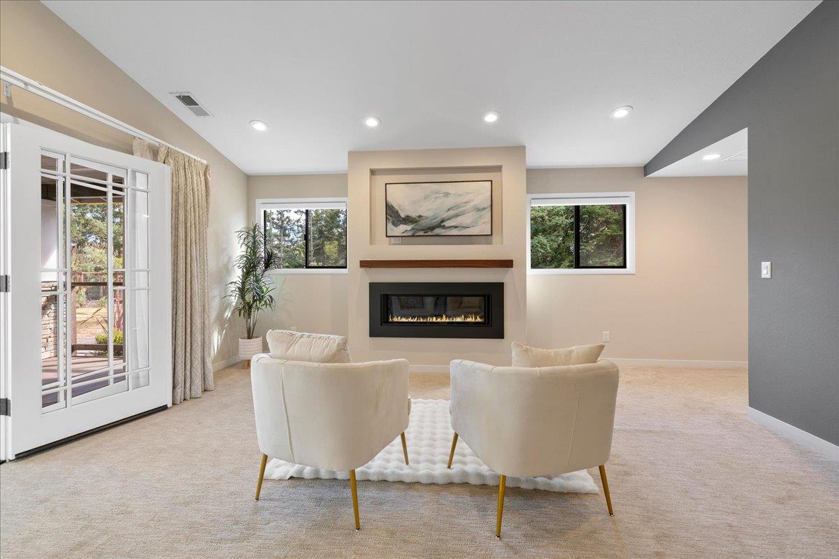 23435 Summit Road Los Gatos, CA 95033 - Photo 38 of 86 a living room with furniture and a fireplace