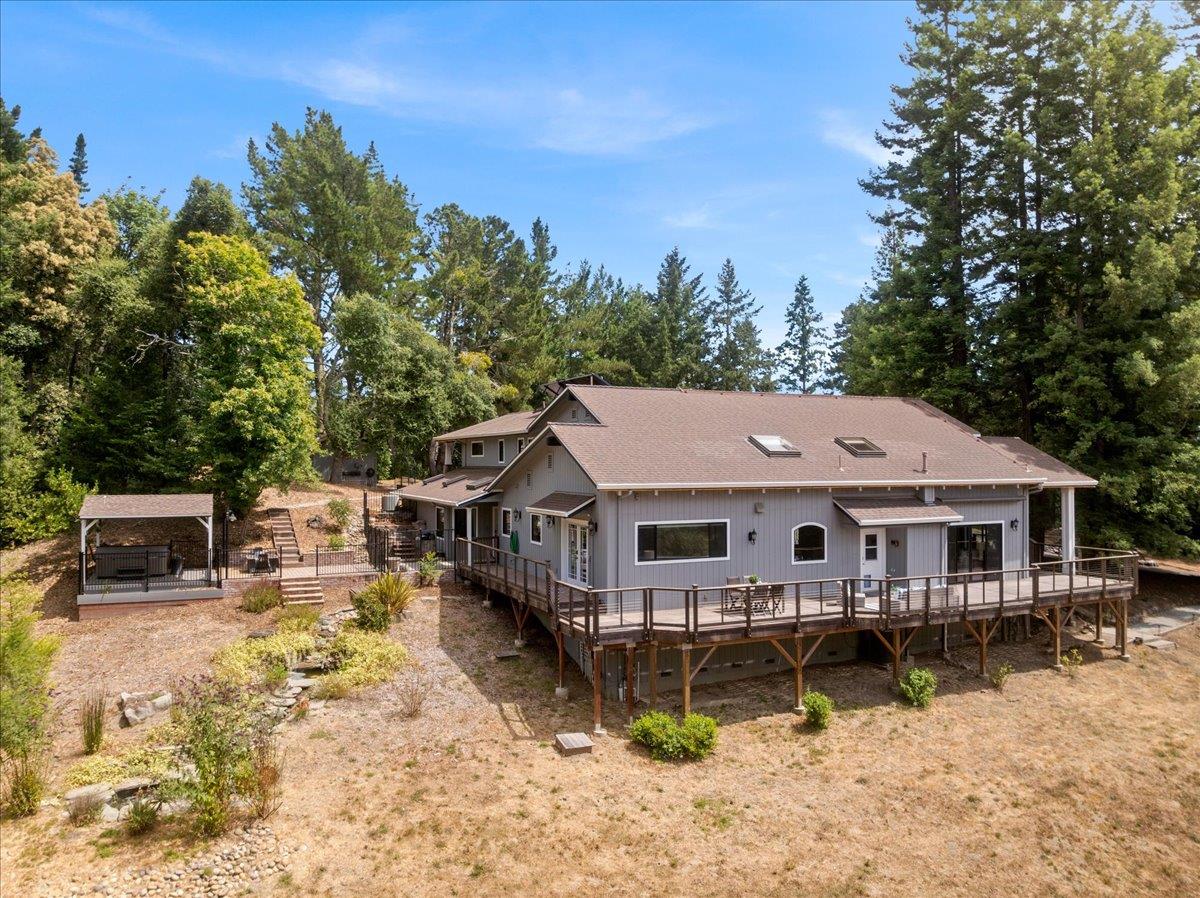 23435 Summit Road Los Gatos, CA 95033 - Photo 72 of 86 an aerial view of a house with swimming pool next to a big yard