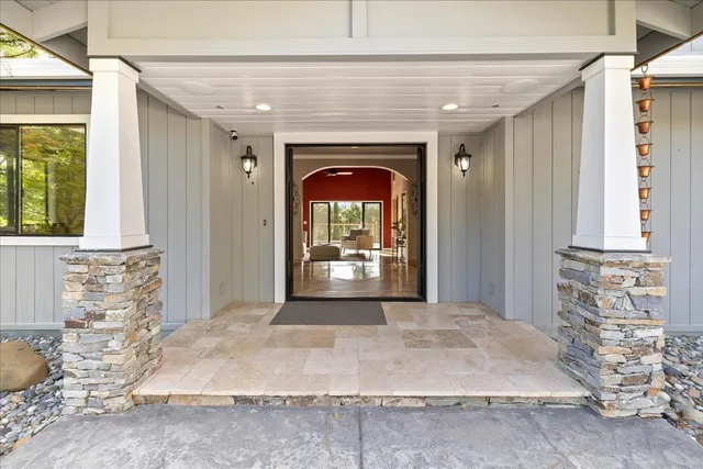 a balcony view with a seating space