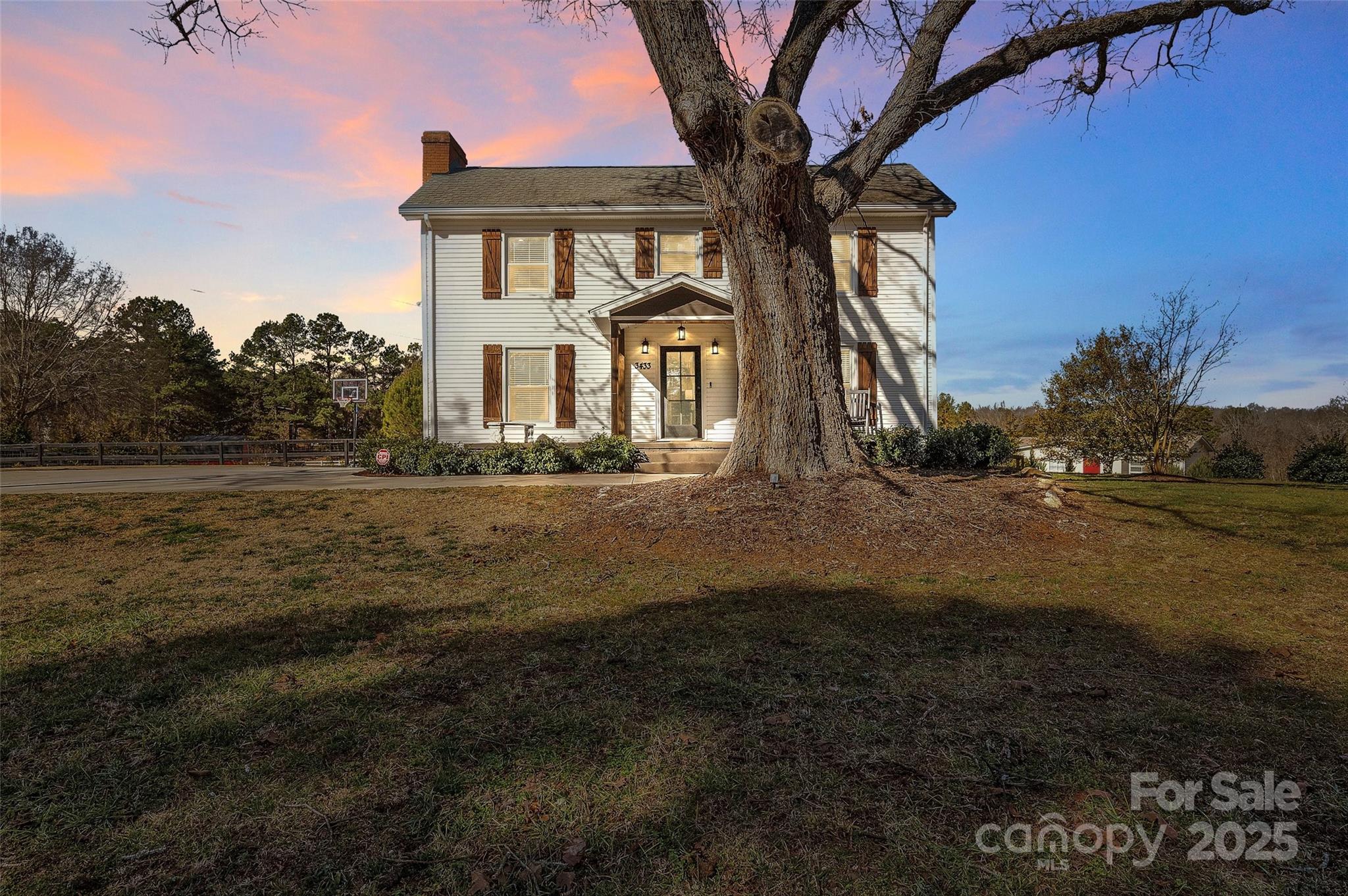 3433 Grey Road Davidson, NC 28036 - Photo 1 of 25 a front view of a house with a yard