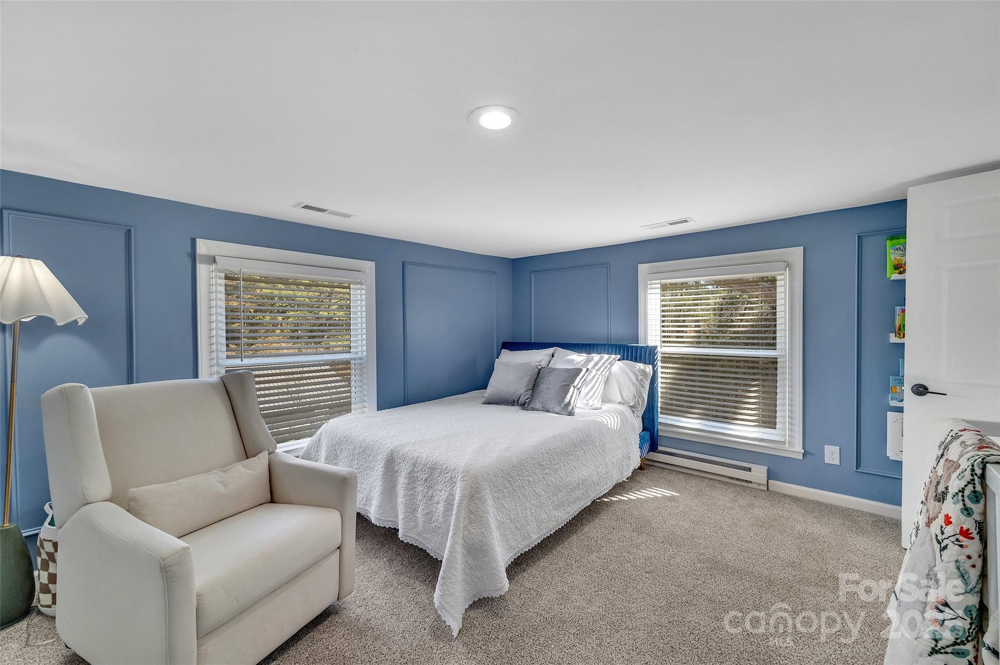 3433 Grey Road Davidson, NC 28036 - Photo 16 of 25 a bedroom with a bed couch and a window
