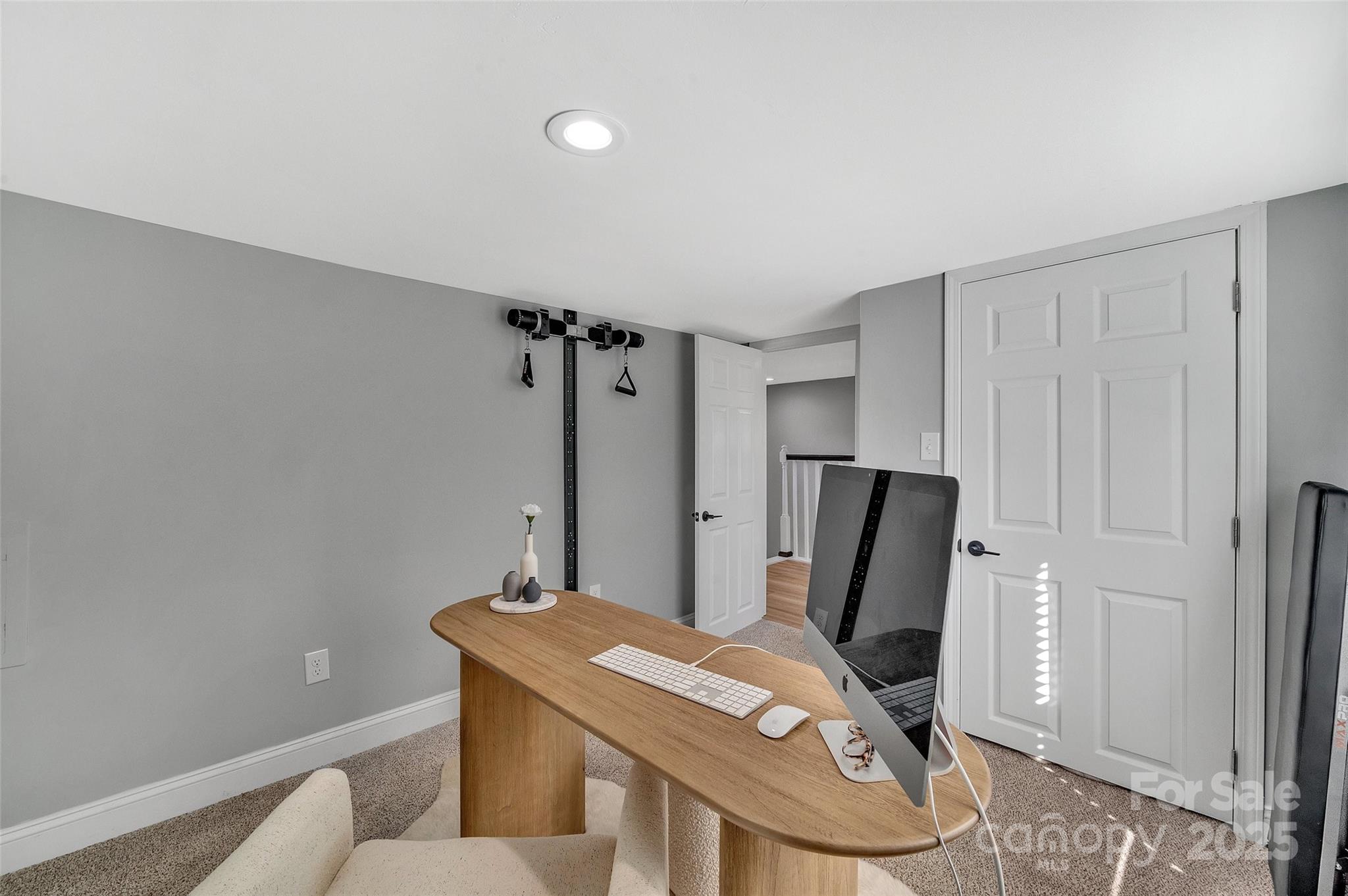 3433 Grey Road Davidson, NC 28036 - Photo 18 of 25 a view of a livingroom with furniture and wooden floor
