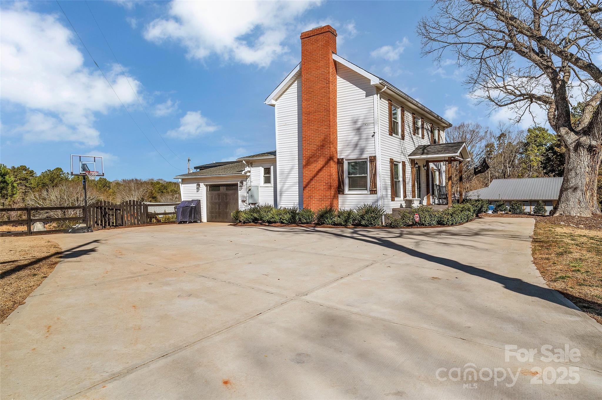 3433 Grey Road Davidson, NC 28036 - Photo 2 of 25 a view of a street in front of a building
