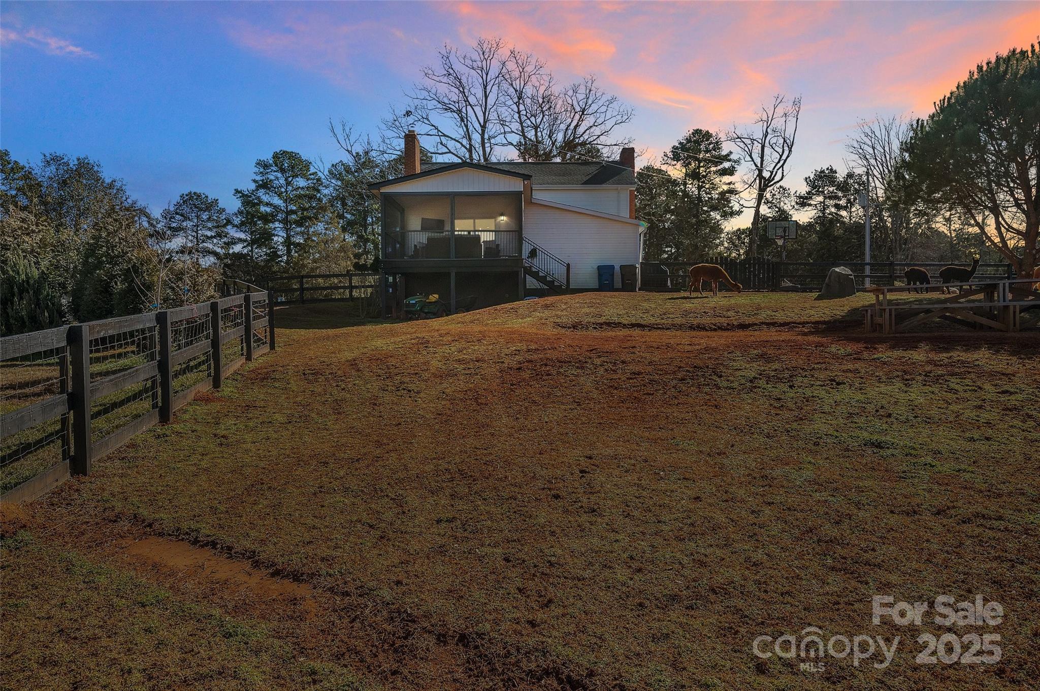 3433 Grey Road Davidson, NC 28036 - Photo 23 of 25 a view of house with yard and trees in the background