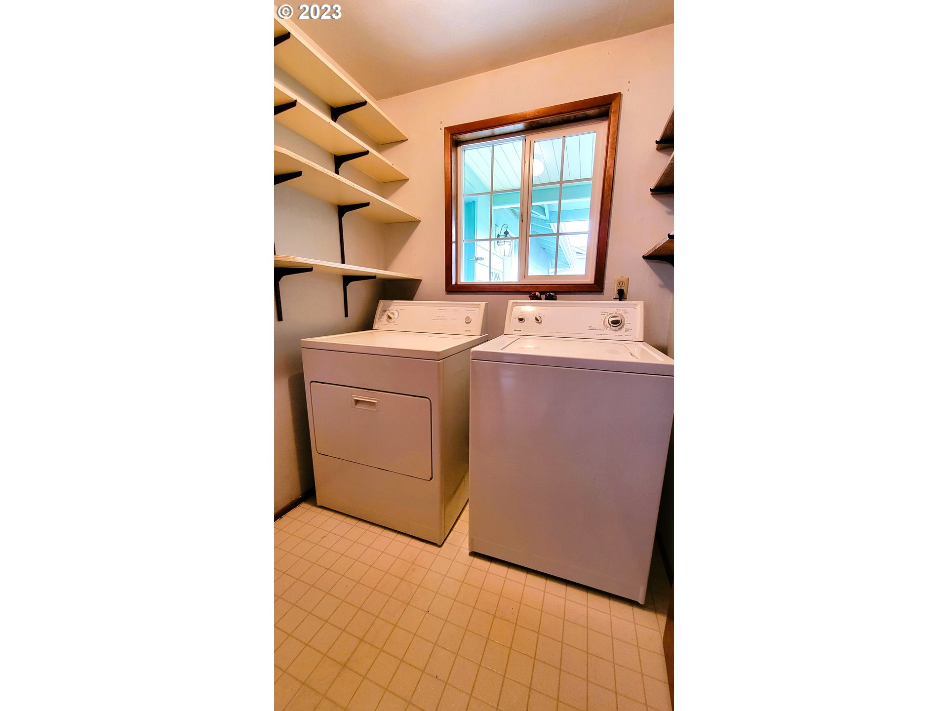 2055 Praslin Street Eugene, OR 97402 - Photo 7 of 14 a kitchen with a sink cabinets and appliances