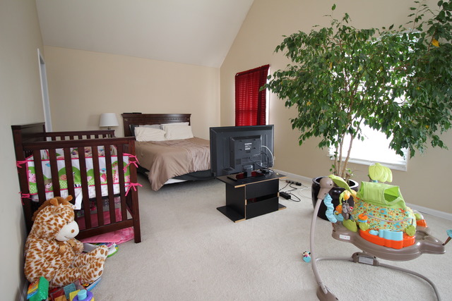 184 South Channing Street Elgin, IL 60120 - Photo 8 of 9 a bedroom with bed and a couch