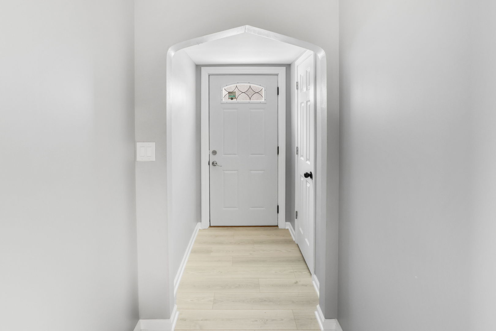 3250 186th Street Lansing, IL 60438 - Photo 12 of 18 a view of a hallway with wooden floor