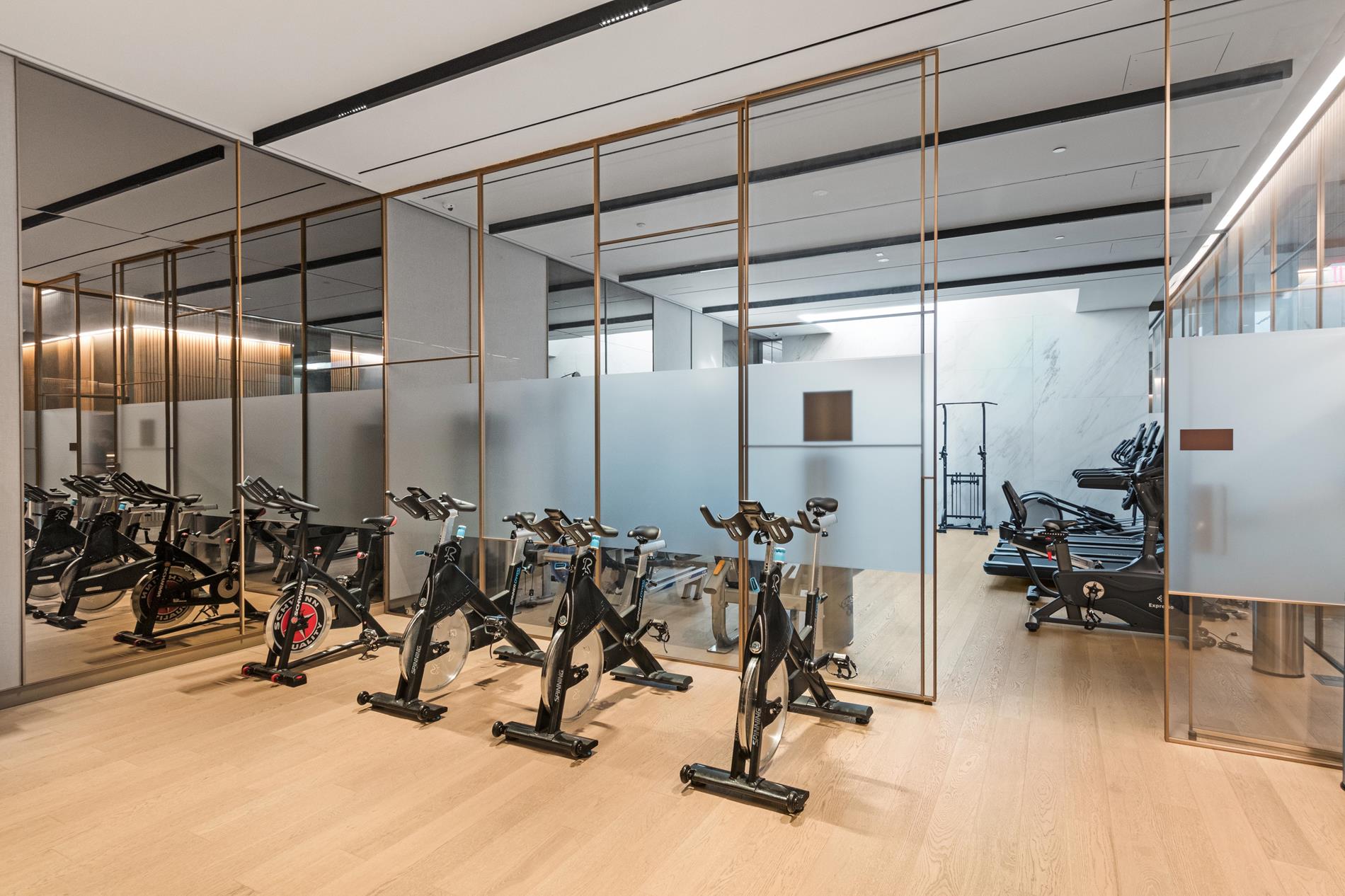 500 West 45th Street, Unit 230 Manhattan, NY 10026 - Photo 6 of 16 a view of a room with gym equipment