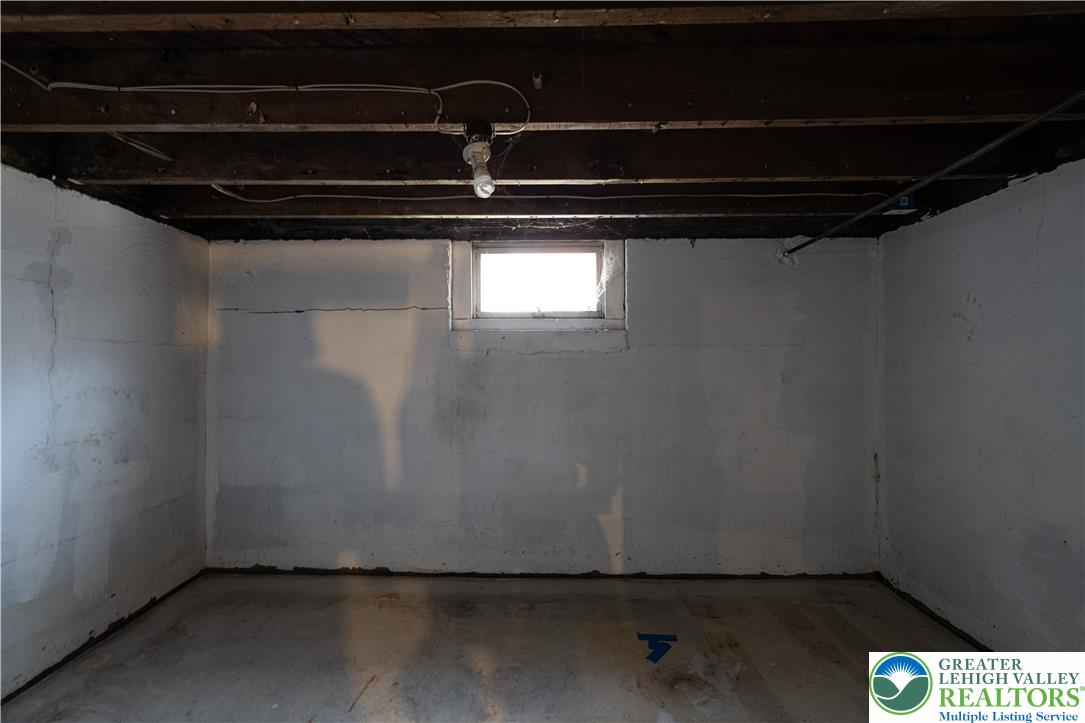 118 South 3rd Street Bangor, PA 18013 - Photo 24 of 33 This spacious basement offers a concrete floor and a small window for natural light.