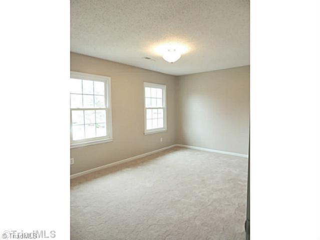 4928 Tower Road, Unit B Greensboro, NC 27410 - Photo 9 of 16 Master Bedroom.