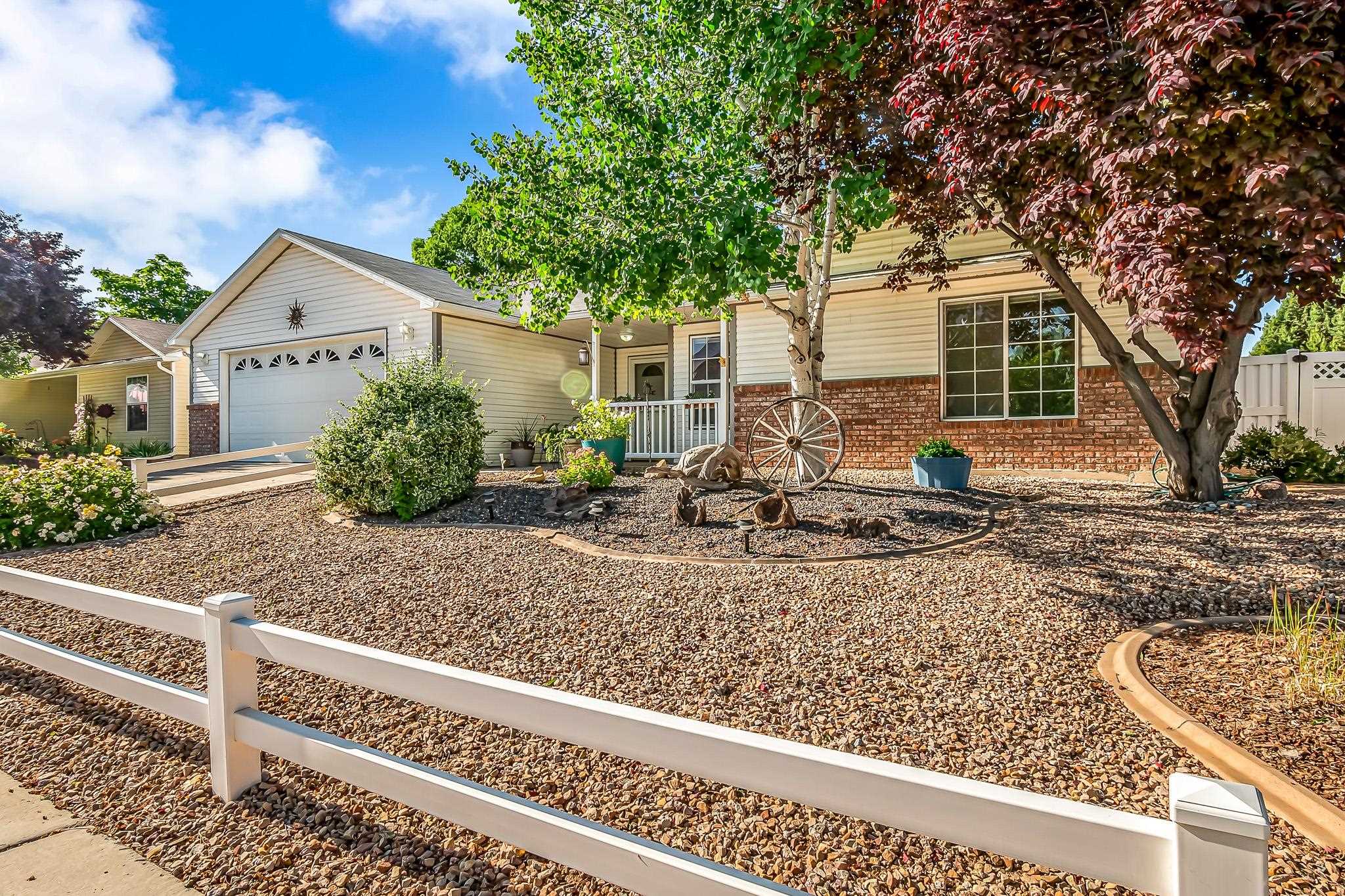 2833 B B 3/10 Road Grand Junction, CO 81503 - Photo 3 of 35 a view of a house with backyard and sitting area