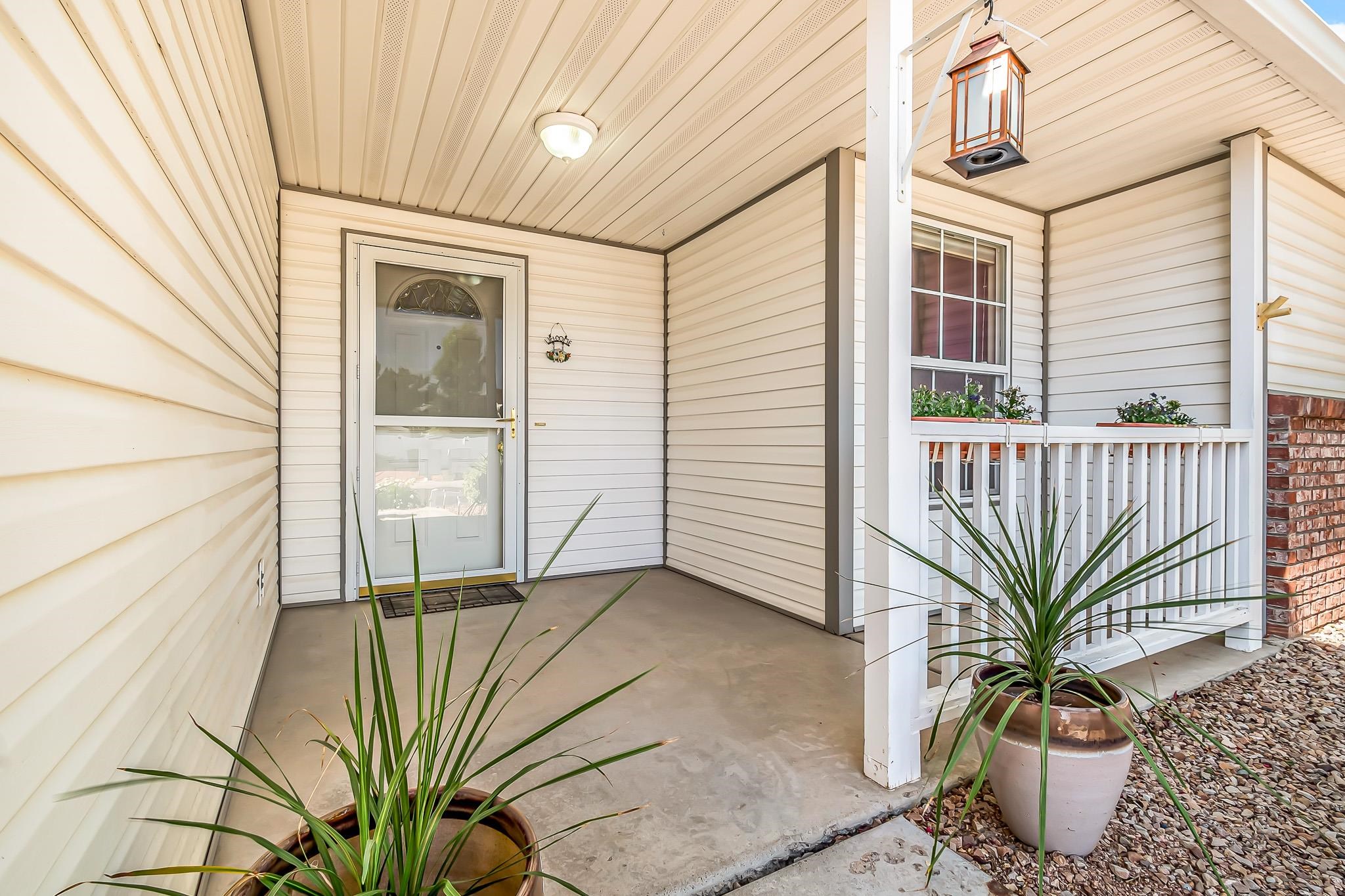 2833 B B 3/10 Road Grand Junction, CO 81503 - Photo 5 of 35 a potted plant in front of a door