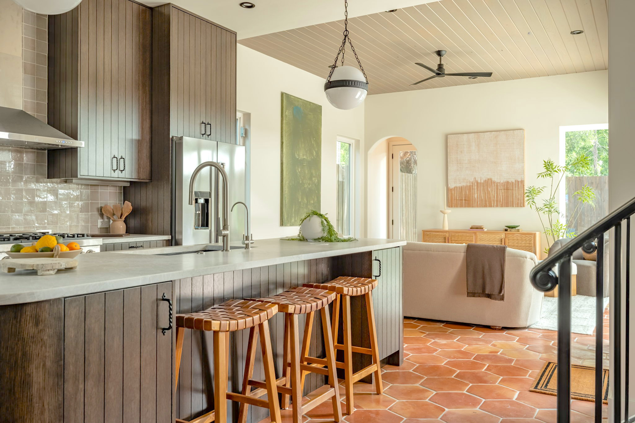 4713 Bolm Road Austin, TX 78702 - Photo 11 of 40 Kitchen island with a light-toned countertop and paneled base