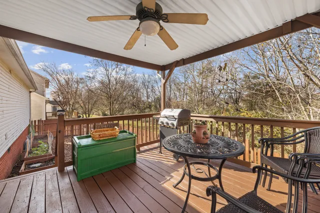 a balcony view with couple of chairs
