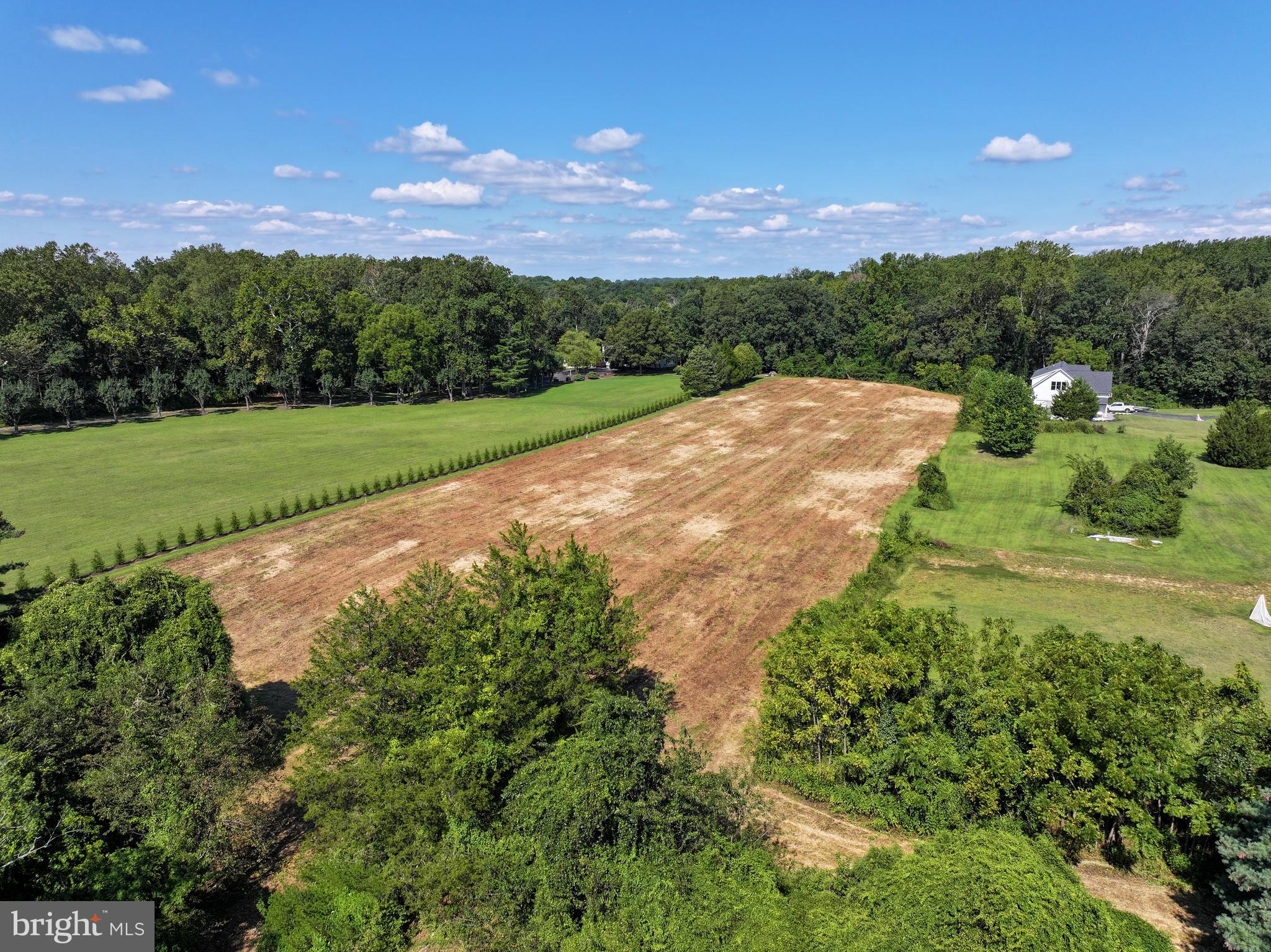 67 Wallace Manor Road Edgewater, MD 21037 - Photo 11 of 36 a view of a garden with an outdoor space