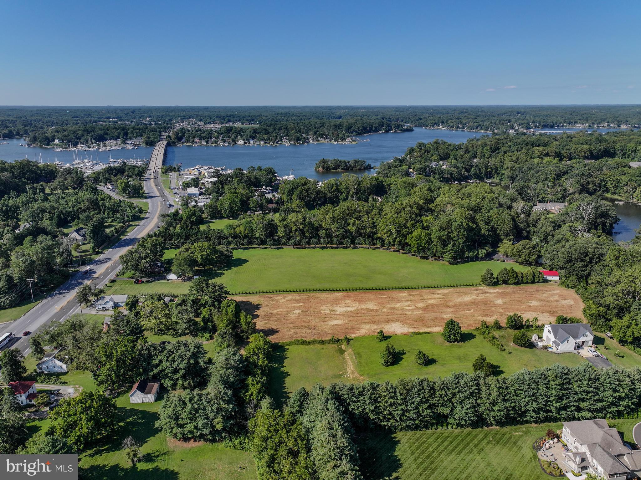 67 Wallace Manor Road Edgewater, MD 21037 - Photo 15 of 36 an aerial view of a residential houses covered in trees