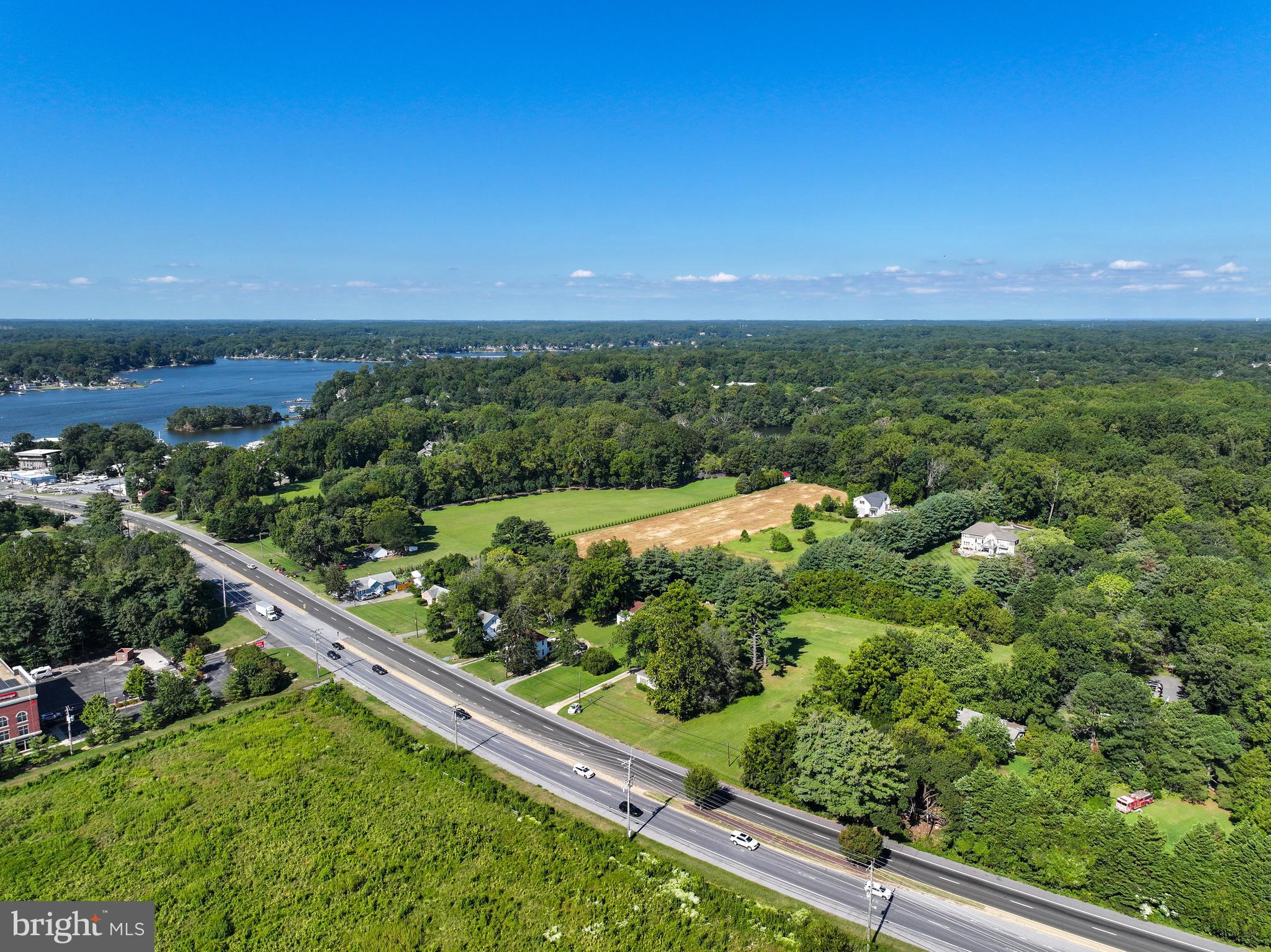 67 Wallace Manor Road Edgewater, MD 21037 - Photo 18 of 36 a view of a city with lush green forest