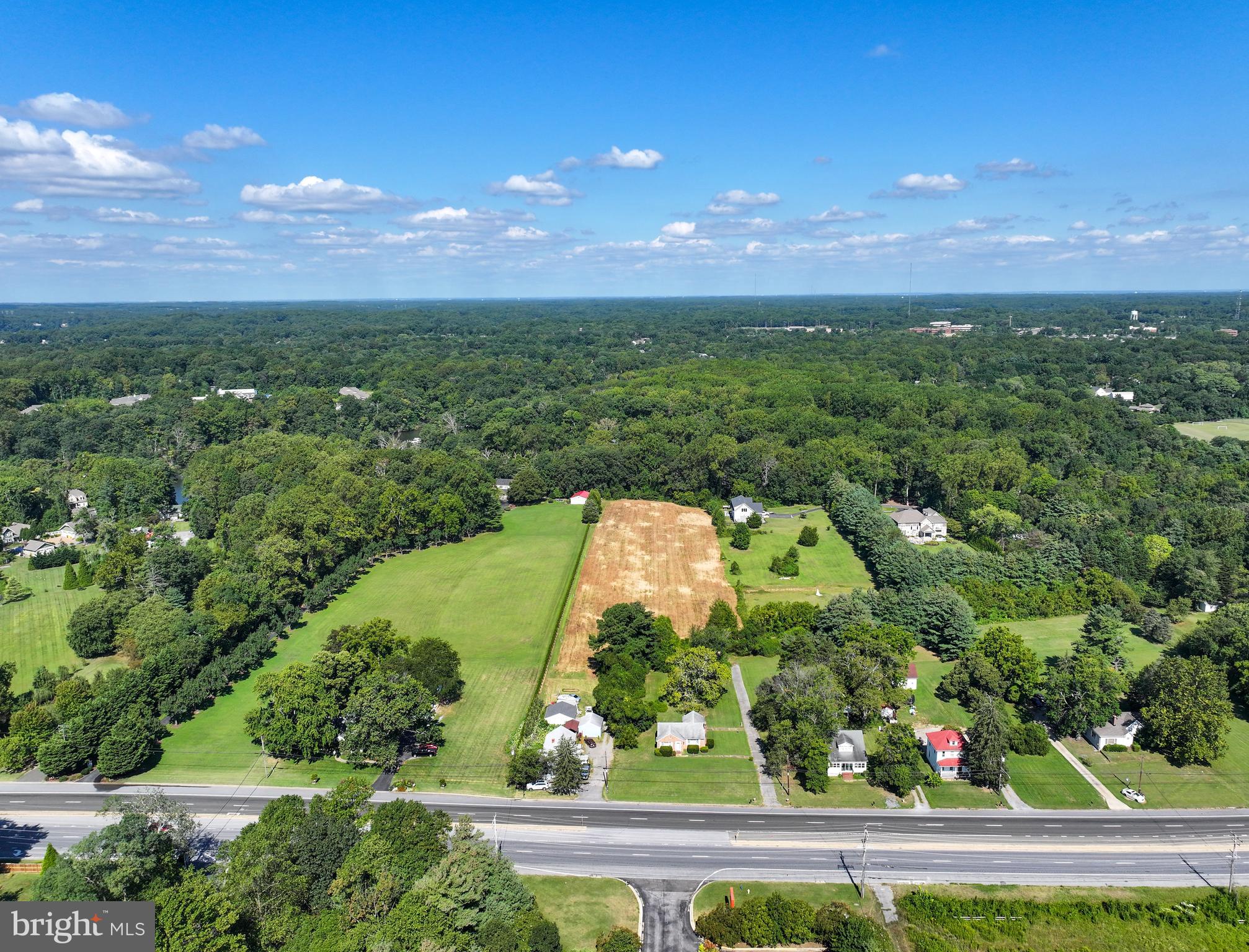 67 Wallace Manor Road Edgewater, MD 21037 - Photo 19 of 36 a view of a lake and a yard