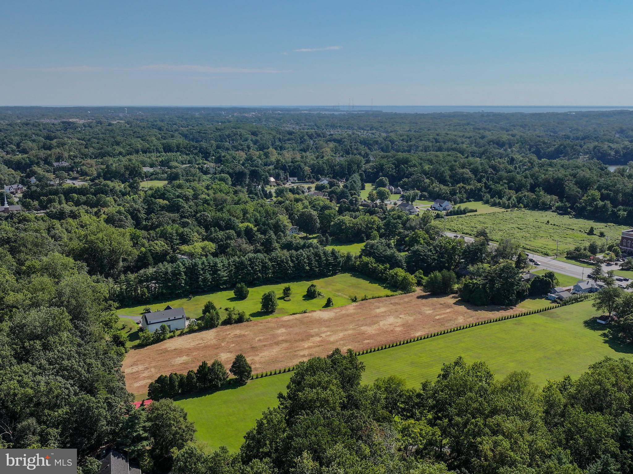 67 Wallace Manor Road Edgewater, MD 21037 - Photo 25 of 36 an aerial view of a houses with yard and green space