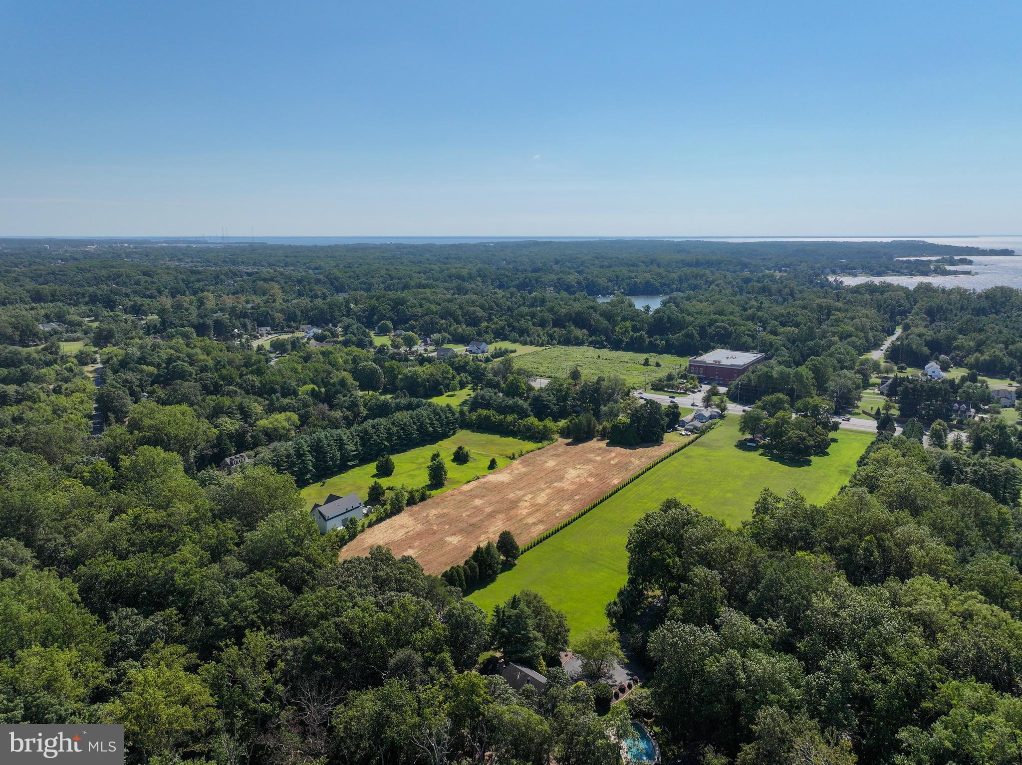 67 Wallace Manor Road Edgewater, MD 21037 - Photo 26 of 36 an aerial view of a house with a yard