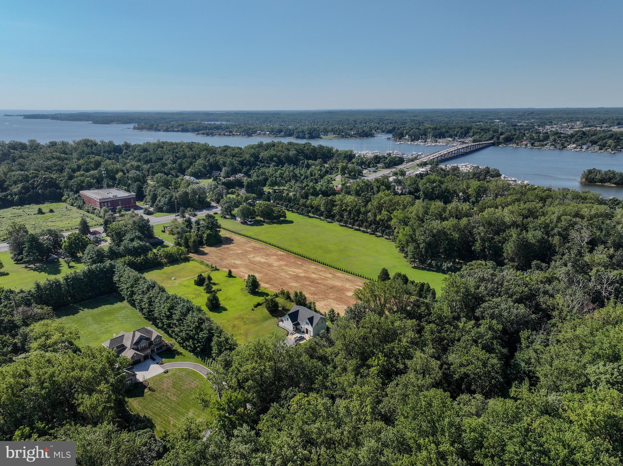 67 Wallace Manor Road Edgewater, MD 21037 - Photo 32 of 36 an aerial view of a city and mountain view in back