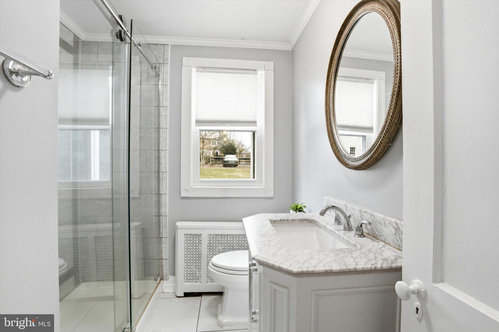 30 Upper Ferry Road Ewing, NJ 08628 - Photo 14 of 29 a bathroom with a granite countertop sink toilet and a mirror