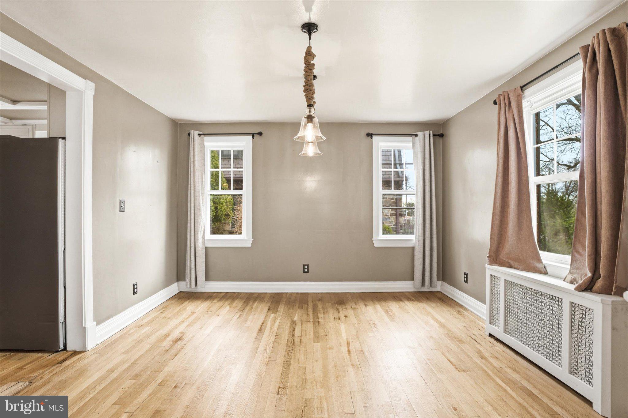 30 Upper Ferry Road Ewing, NJ 08628 - Photo 5 of 29 a view of empty room with wooden floor and fan