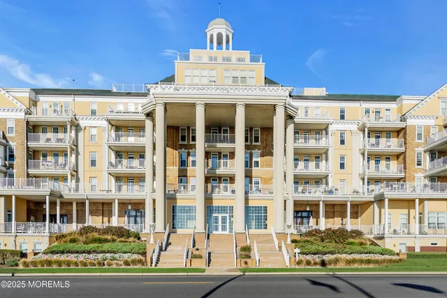 a front view of a building with street view
