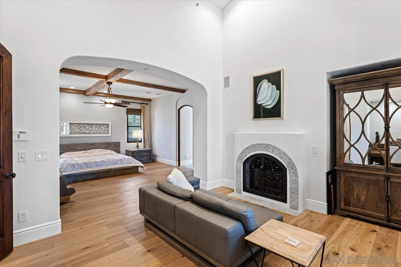 1202 Via Zamia Encinitas, CA 92024 - Photo 10 of 41 a living room with furniture and a fireplace